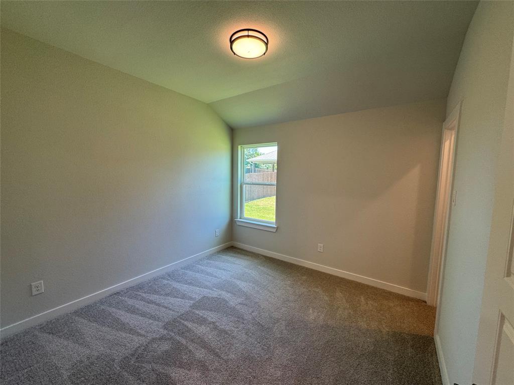 605 Finlee Way Tioga, TX 76271 - Photo 5 of 22 a view of an empty room with a window