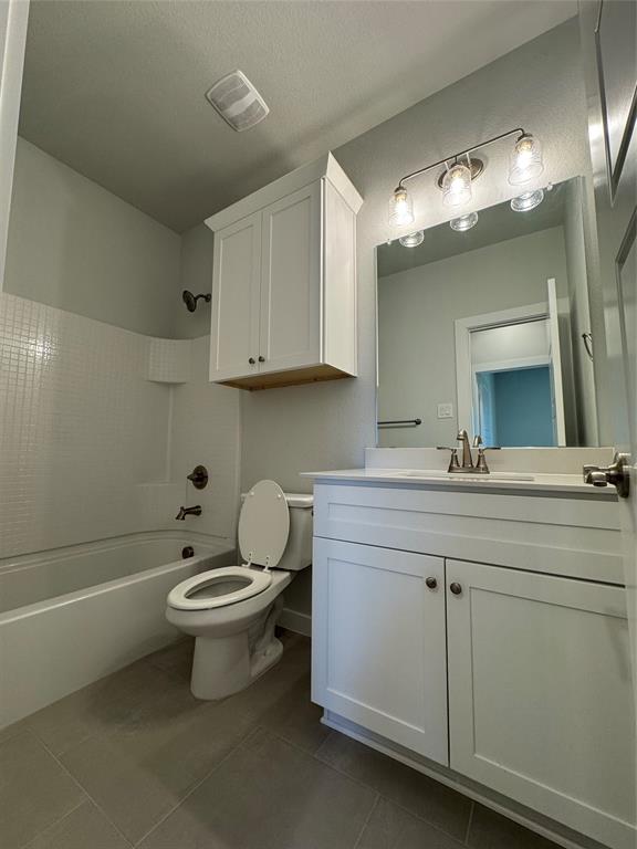 605 Finlee Way Tioga, TX 76271 - Photo 7 of 22 a bathroom with a toilet sink and mirror
