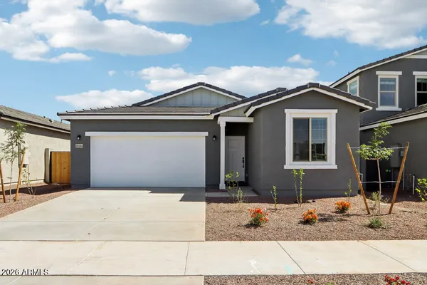 a front view of a house with entertaining space