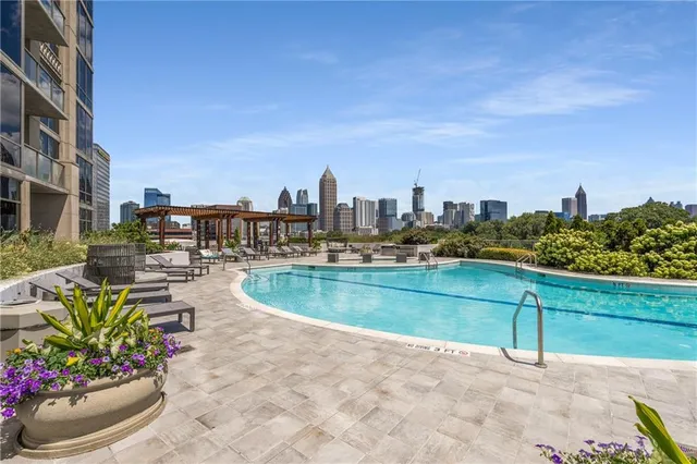 a view of a swimming pool with a terrace