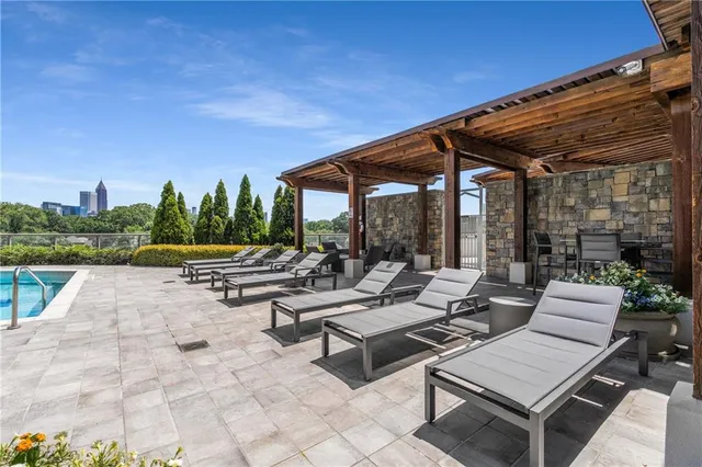 a outdoor space with lots of tables and chairs