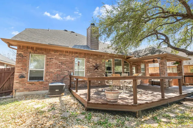 a view of a house with a yard balcony