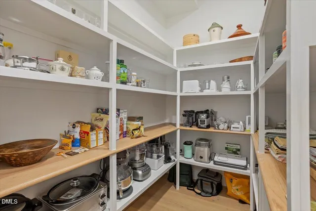 a utility room with sink dryer and washer
