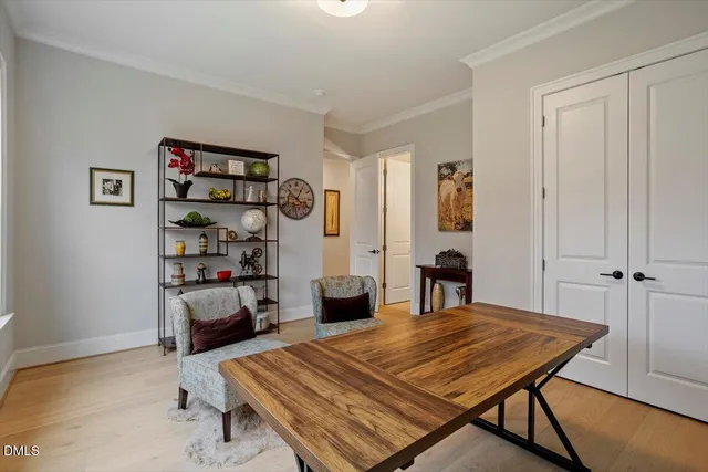 a bedroom with furniture and a window