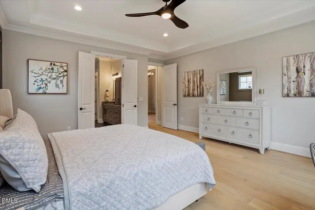 a bathroom with a double vanity sink a mirror and a shower