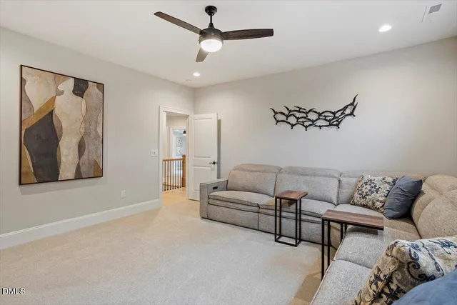 a view of a livingroom with furniture and window