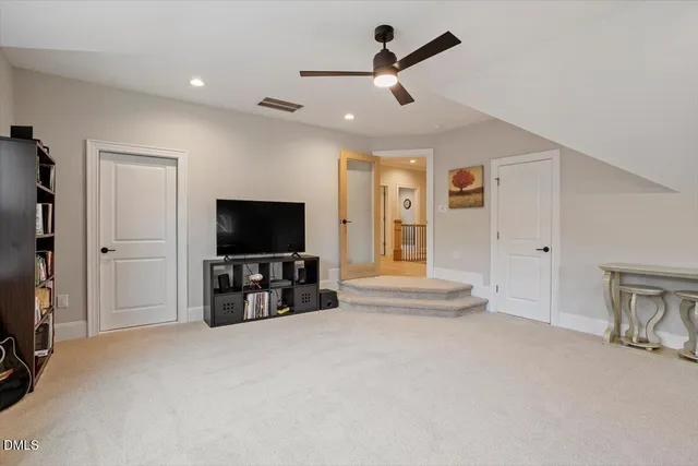 a view of a balcony with furniture and wooden floor