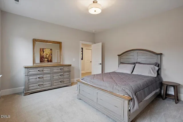 a view of a patio with table and chairs
