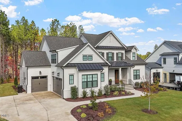 a view of a swimming pool with lounge chairs