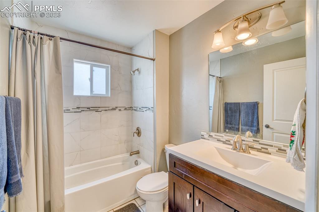 45 Duke Street Pueblo, CO 81005 - Photo 17 of 49 a bathroom with a sink toilet tub and shower