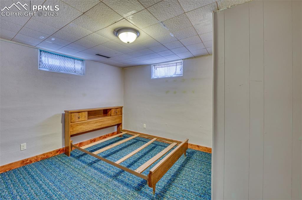 45 Duke Street Pueblo, CO 81005 - Photo 31 of 49 a room with wooden floor