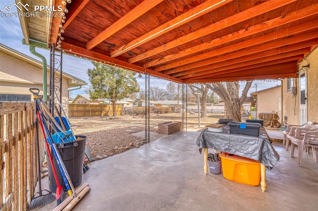 45 Duke Street Pueblo, CO 81005 - Photo 33 of 49 a living room with furniture and a floor to ceiling window