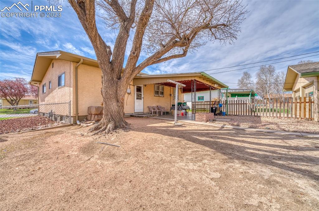 45 Duke Street Pueblo, CO 81005 - Photo 38 of 49 a view of a house with a yard