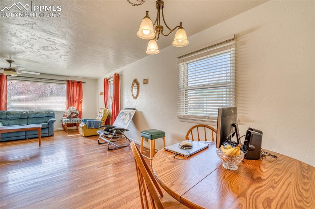 45 Duke Street Pueblo, CO 81005 - Photo 7 of 49 a view of a dining room with furniture window and wooden floor