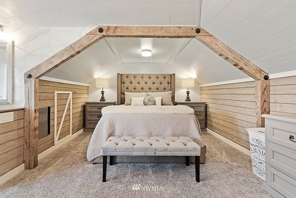 6601 Highland Drive Everett, WA 98203 - Photo 14 of 32 a bed sitting in a bedroom next to a window