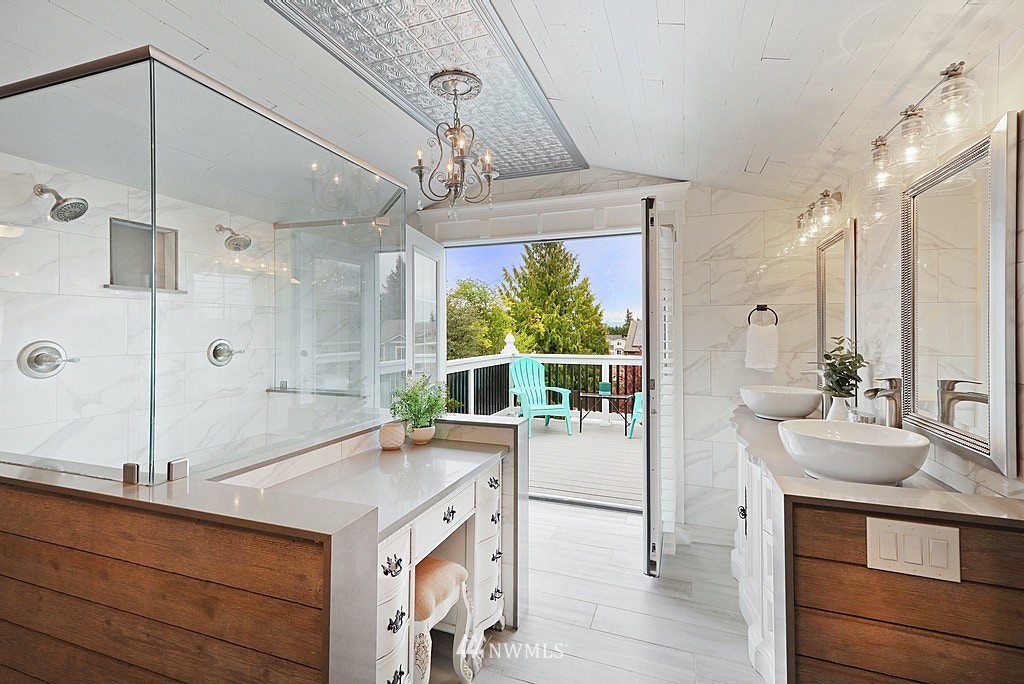 6601 Highland Drive Everett, WA 98203 - Photo 17 of 32 a kitchen with a sink and a refrigerator