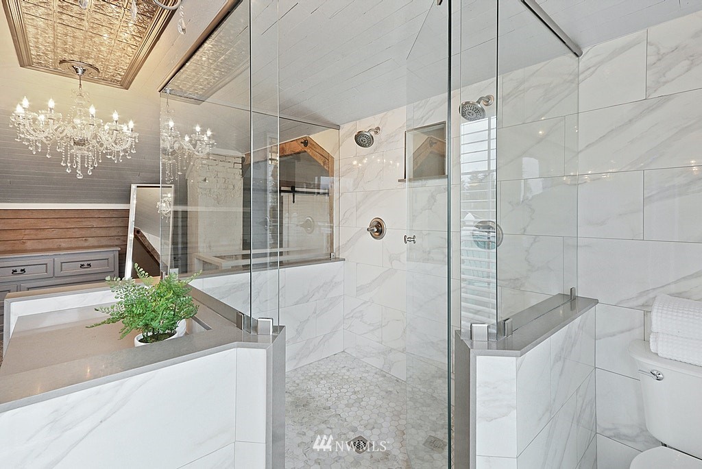 6601 Highland Drive Everett, WA 98203 - Photo 19 of 32 a bathroom with a shower and a sink