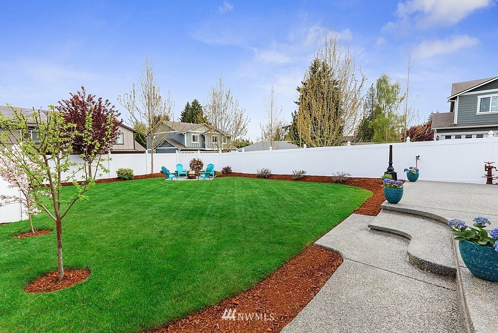 6601 Highland Drive Everett, WA 98203 - Photo 26 of 32 a view of a garden with trees