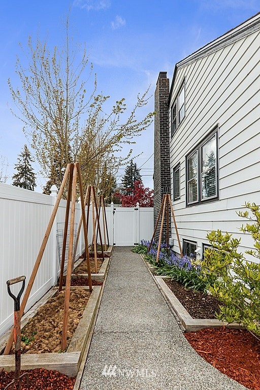 6601 Highland Drive Everett, WA 98203 - Photo 27 of 32 a view of a house with backyard and trees