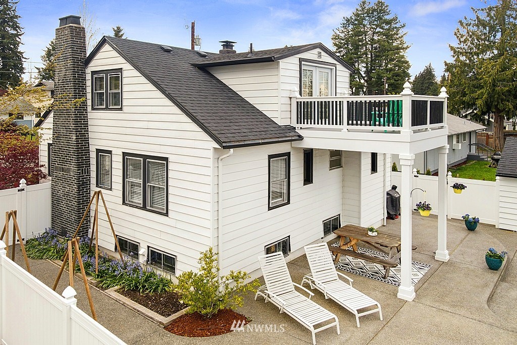 6601 Highland Drive Everett, WA 98203 - Photo 28 of 32 a view of a house with a backyard