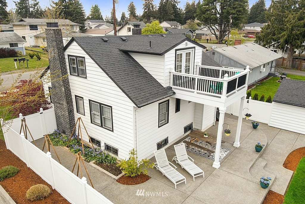 6601 Highland Drive Everett, WA 98203 - Photo 30 of 32 a view of a house with a yard