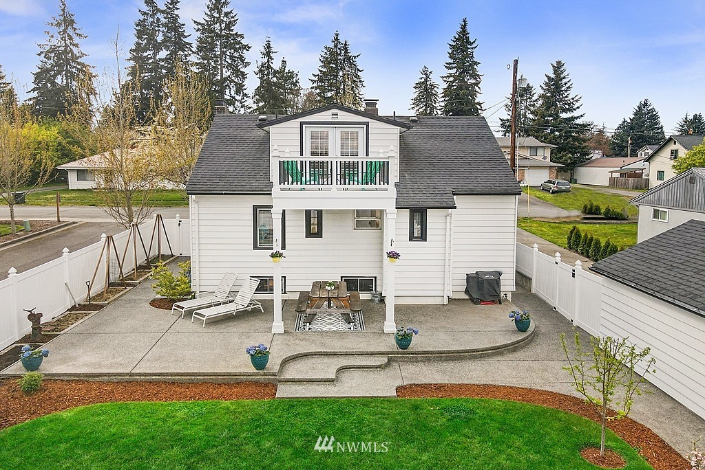 6601 Highland Drive Everett, WA 98203 - Photo 31 of 32 a view of a house with backyard and sitting area