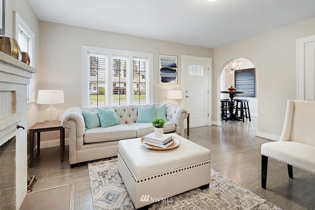 6601 Highland Drive Everett, WA 98203 - Photo 4 of 32 a living room with fireplace furniture and a table