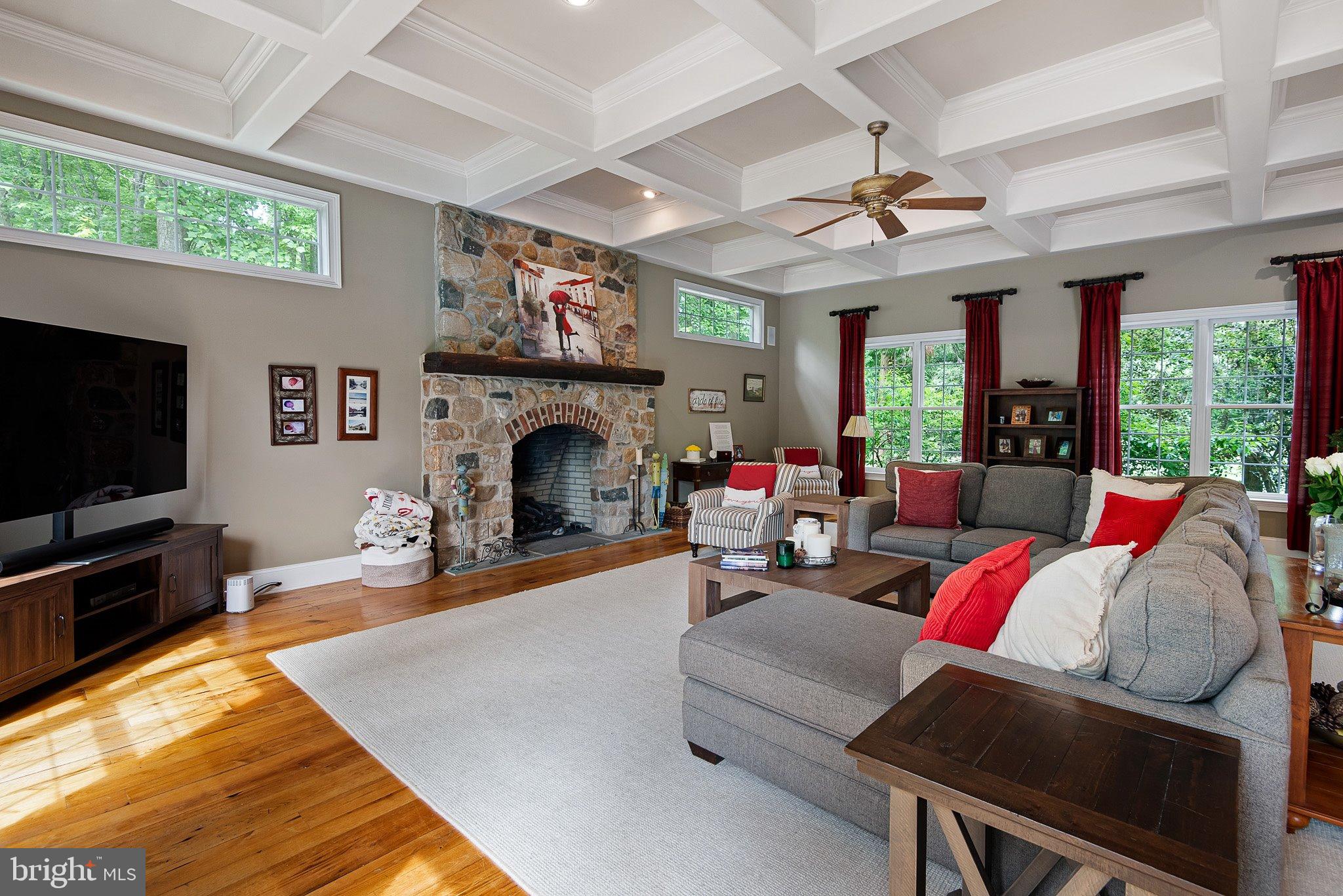 104 Timber Ridge Lane Chadds Ford, PA 19317 - Photo 17 of 65 a living room with furniture fireplace and flat screen tv