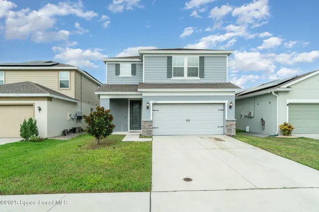 a view of a house with a outdoor space