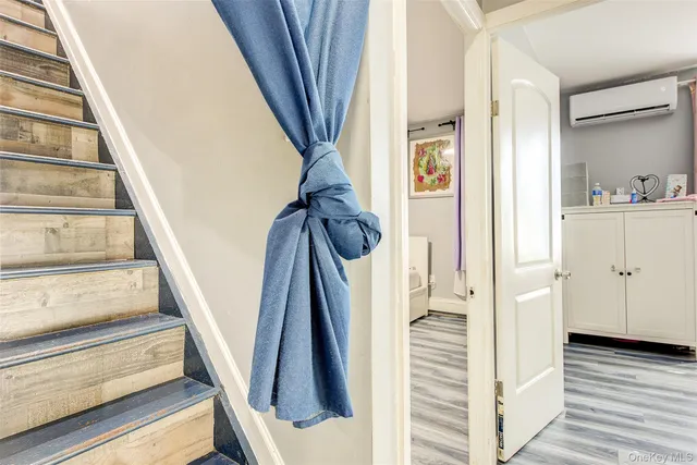 a view of storage and utility room with washer and dryer