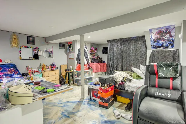 a house view with a sitting space and garden