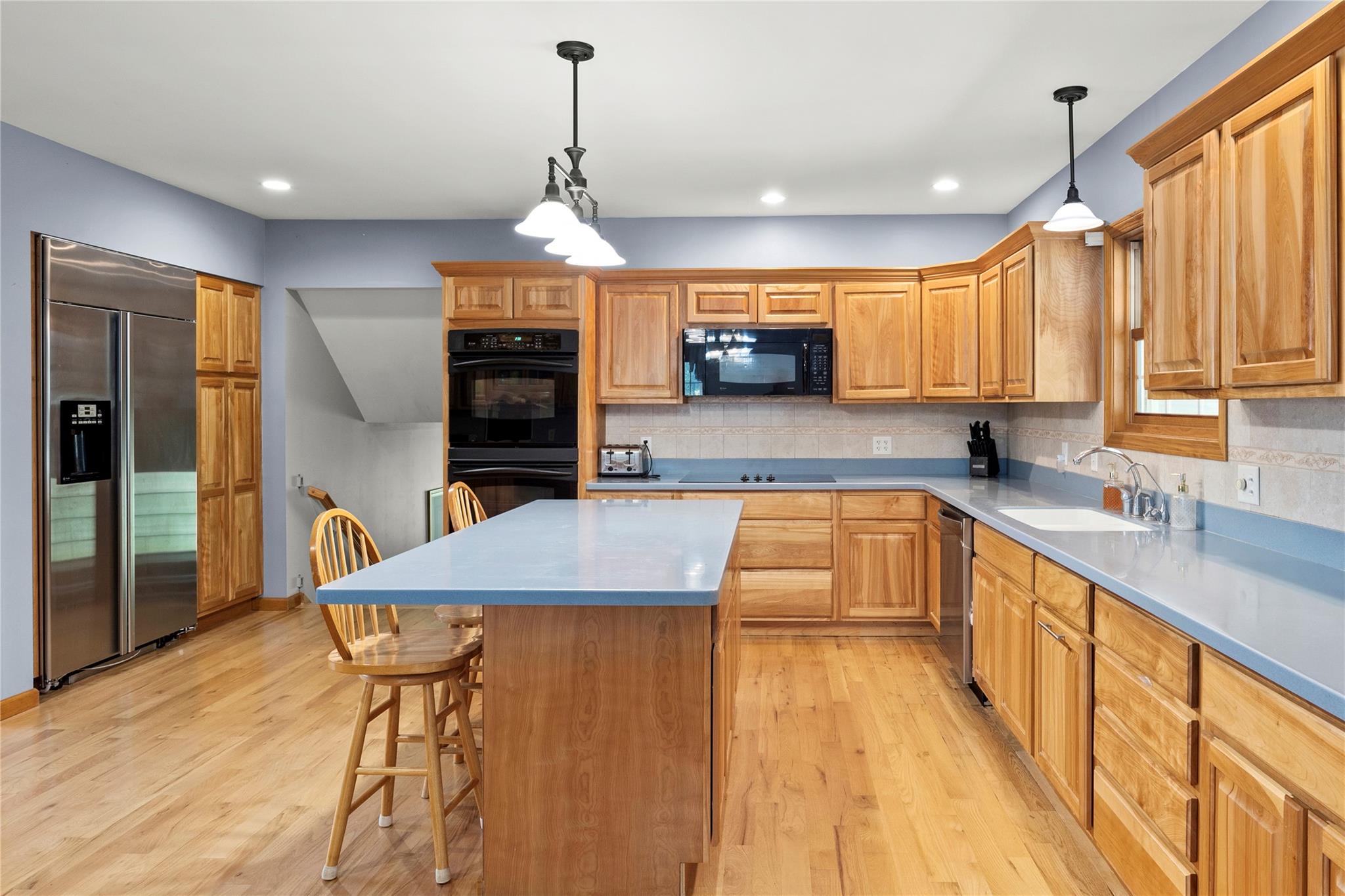 478 High Rock Road New Baltimore, NY 12124 - Photo 16 of 42 a kitchen with stainless steel appliances kitchen island granite countertop a sink and cabinets