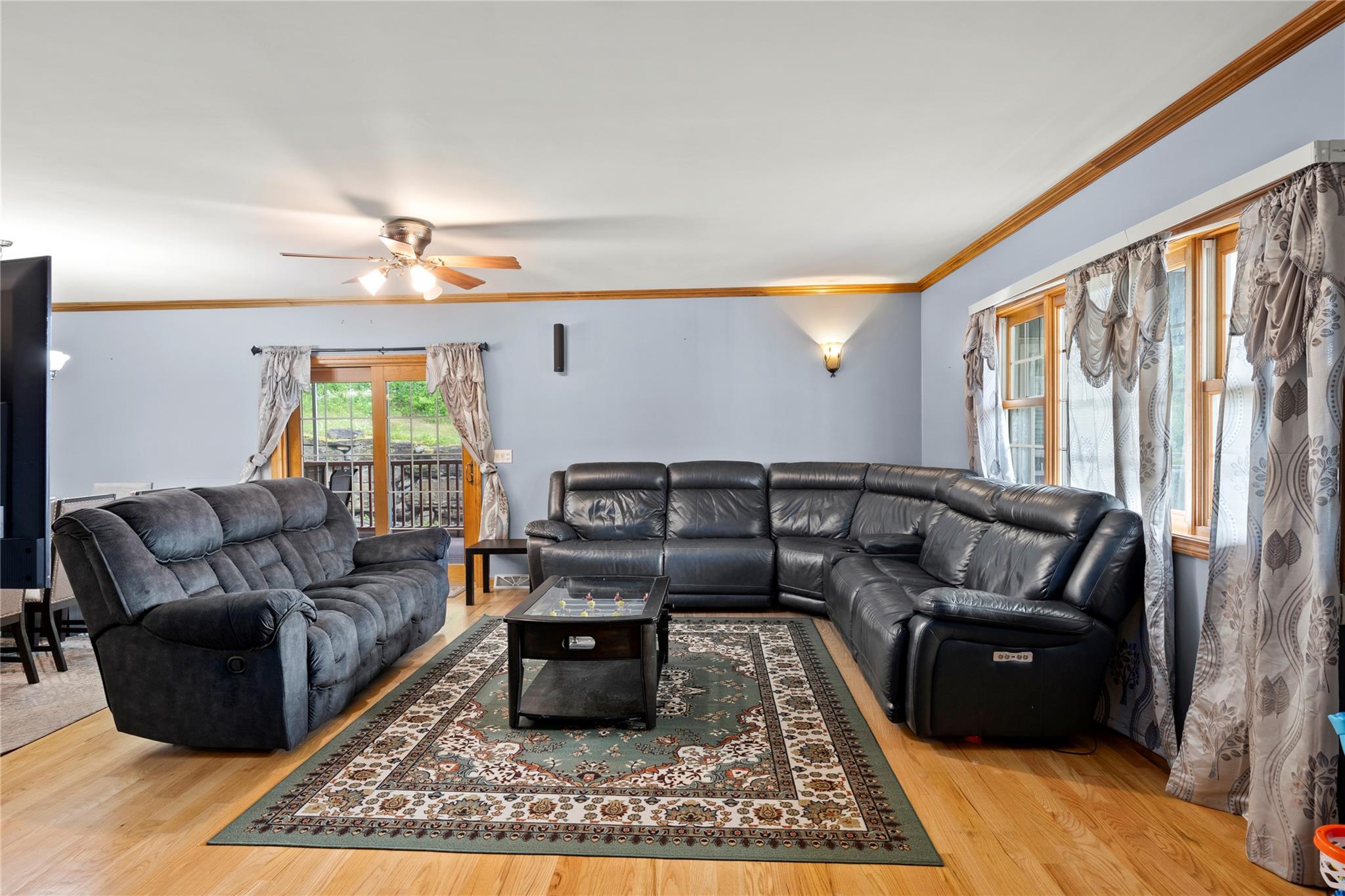 478 High Rock Road New Baltimore, NY 12124 - Photo 19 of 42 a living room with furniture and a rug