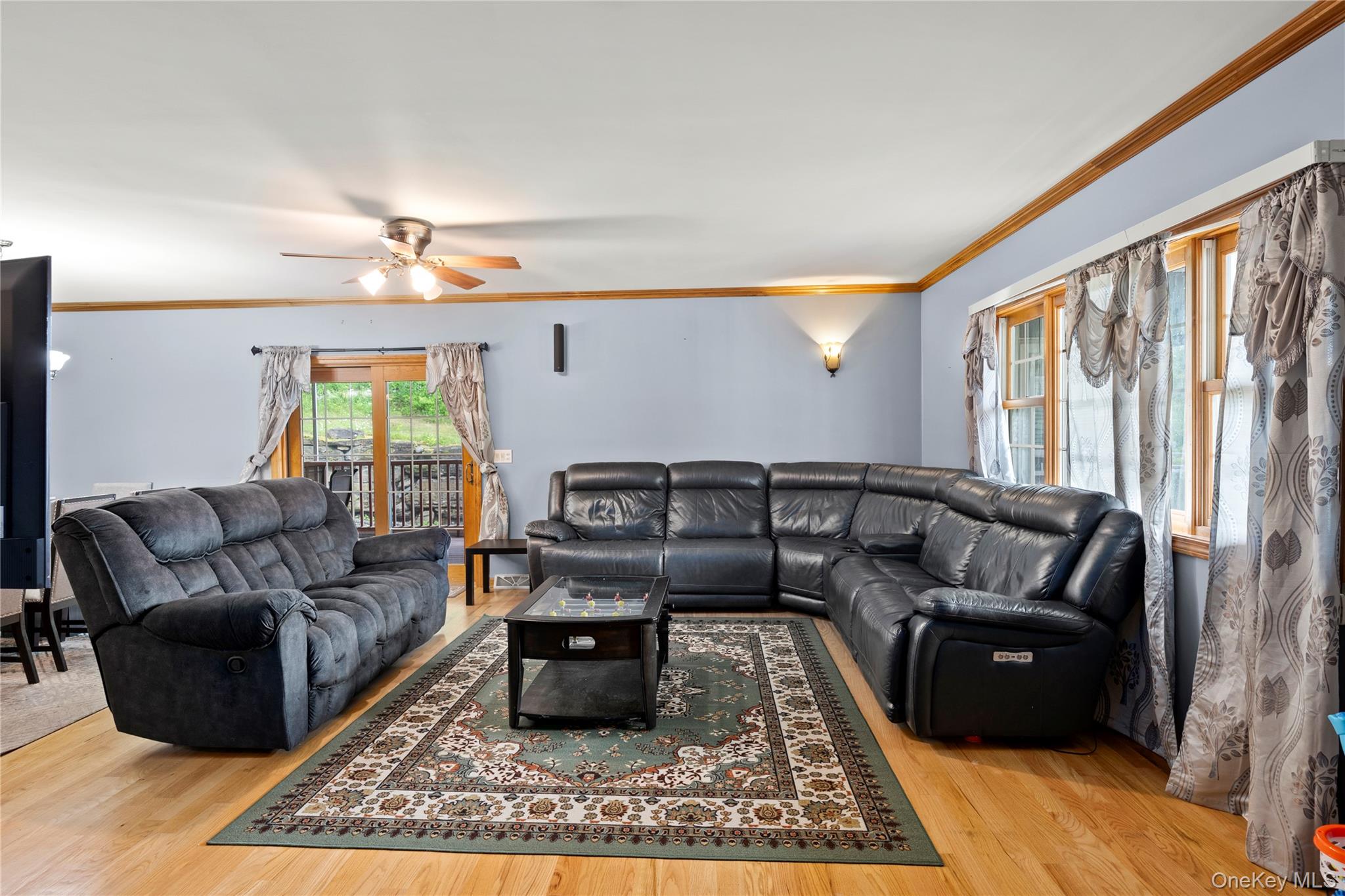 478 High Rock Road New Baltimore, NY 12124 - Photo 19 of 42 a living room with furniture and a rug