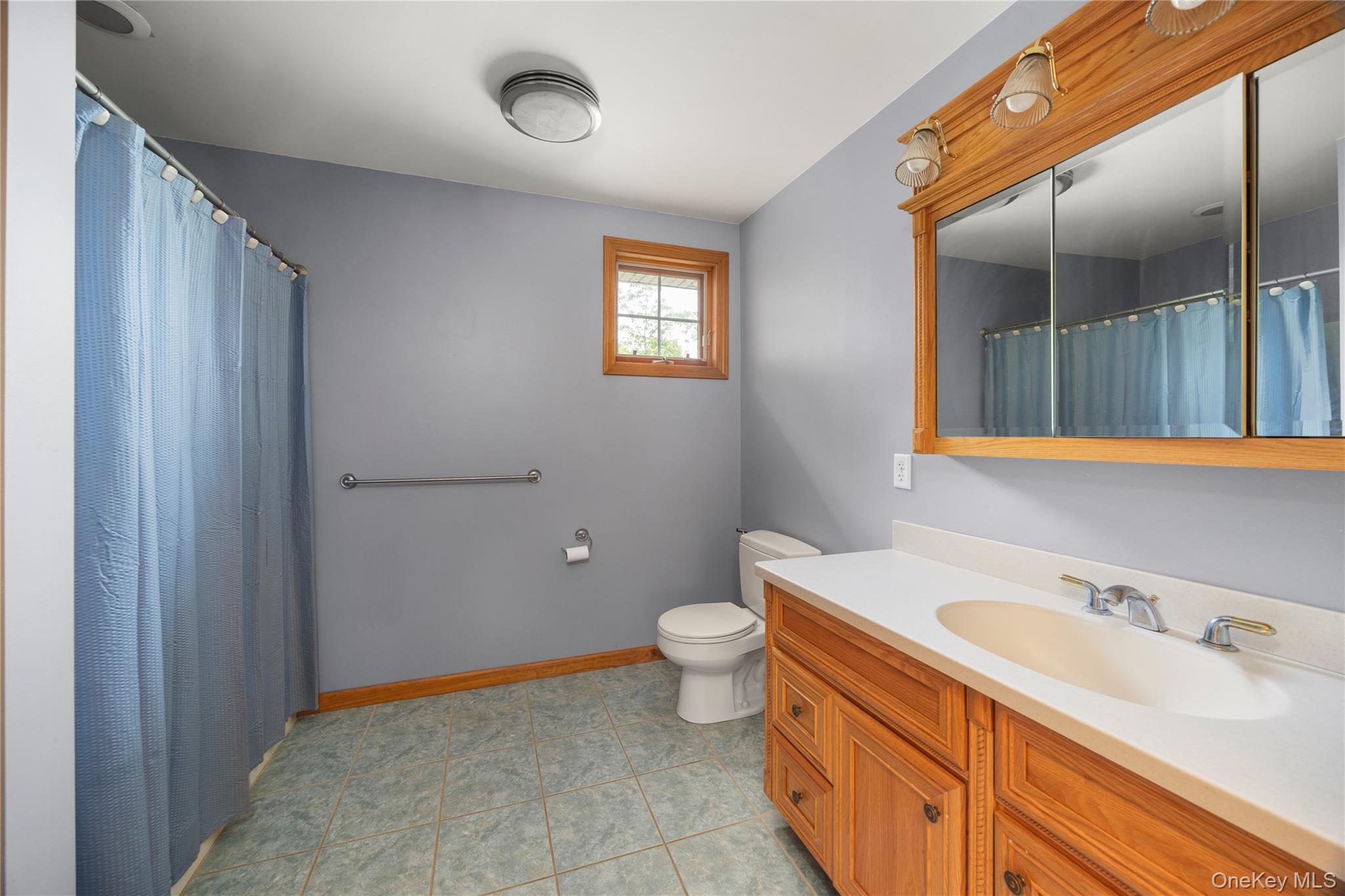 478 High Rock Road New Baltimore, NY 12124 - Photo 24 of 42 a bathroom with a sink and a toilet