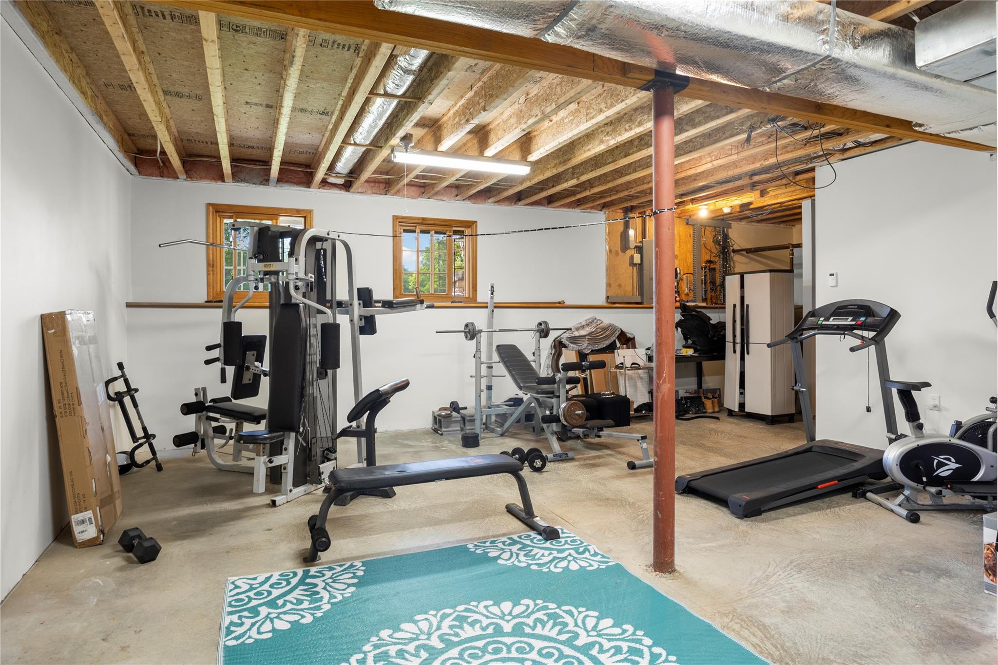 478 High Rock Road New Baltimore, NY 12124 - Photo 28 of 42 a view of a room with gym equipment