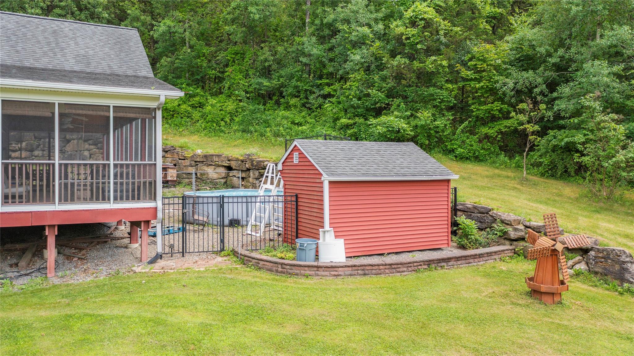 478 High Rock Road New Baltimore, NY 12124 - Photo 35 of 42 a backyard of a house with barbeque oven