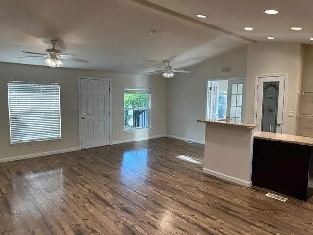 a bathroom with a glass shower door