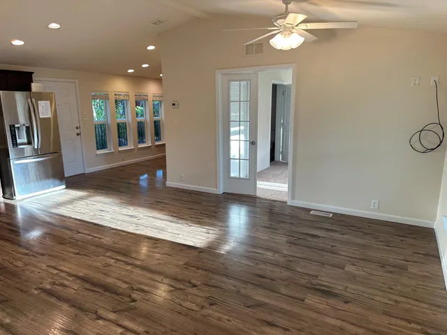 a view of closet area with stairs