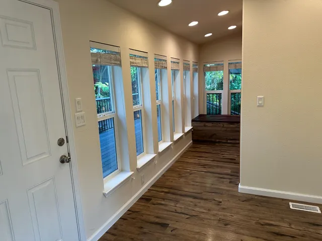 a view of a room that has a window in it