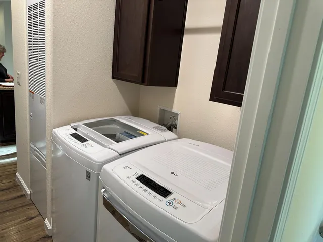 a view of a balcony with wooden floor