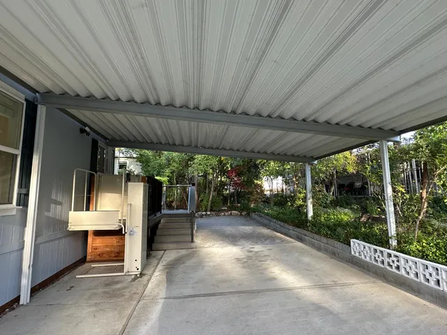 a backyard of a house with lots of green space