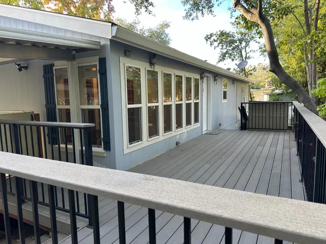 a view of balcony and wooden floor