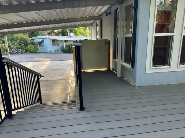 a view of a garden from a balcony