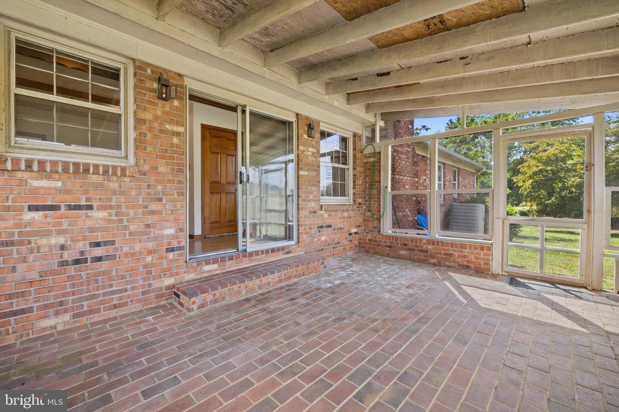 95 Harris Hollow Road Washington, VA 22747 - Photo 58 of 81 Bricked patio/screen porch