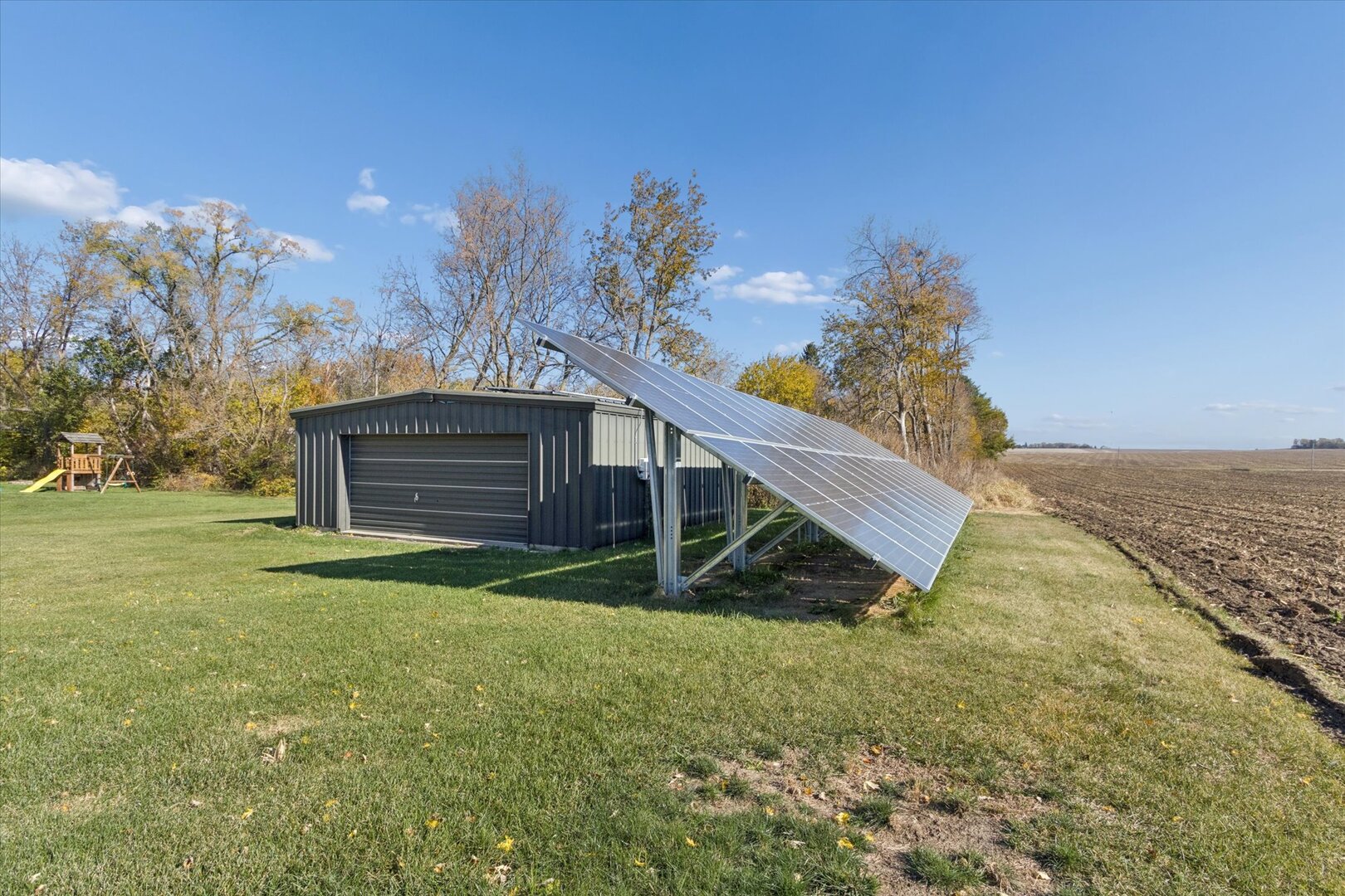 97 Highcrest Court Shannon, IL 61078 - Photo 16 of 58 a view of a backyard