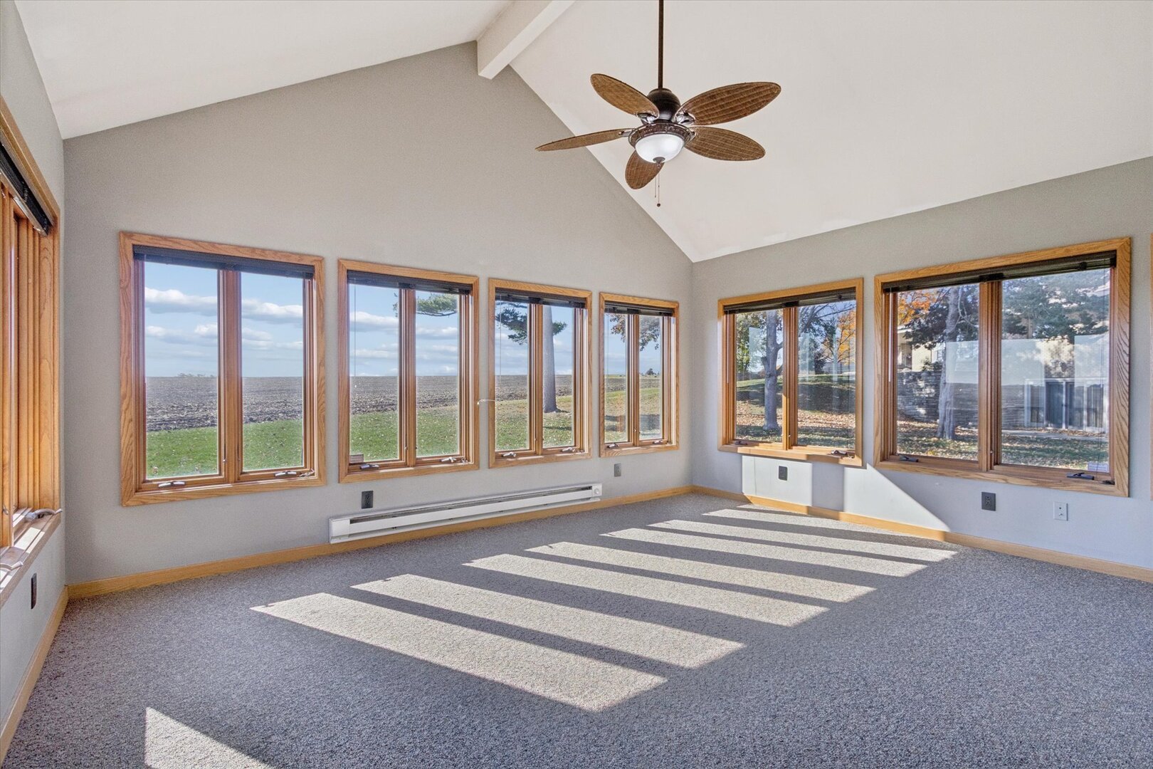 97 Highcrest Court Shannon, IL 61078 - Photo 18 of 58 a spacious bedroom with a large bed and a large window