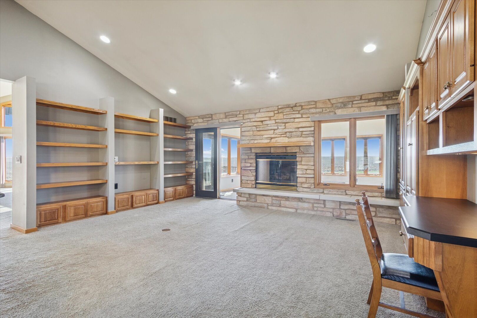 97 Highcrest Court Shannon, IL 61078 - Photo 26 of 58 a view of an empty room with a fireplace and furniture
