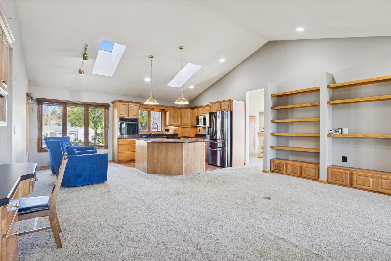 97 Highcrest Court Shannon, IL 61078 - Photo 28 of 58 a living room with furniture and kitchen view