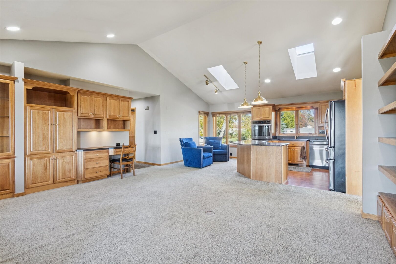 97 Highcrest Court Shannon, IL 61078 - Photo 29 of 58 a living room with furniture and kitchen view